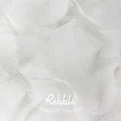 Ribbli white fringe ribbon accents bridal bouquets with delicate fringe and refined appeal