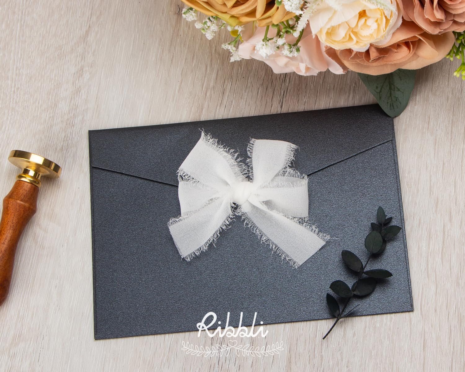 Ribbli white fringe ribbon adds a premium touch to wedding invitations