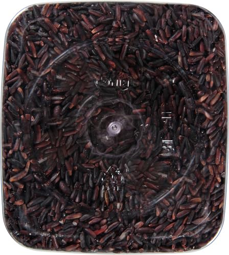 Rinsed RiceSelect Black Rice in a measuring cup ready to cook.