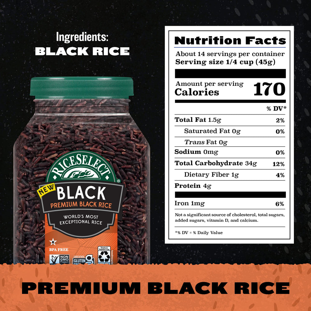 Uncooked RiceSelect Black Rice grains spread on a wooden board.