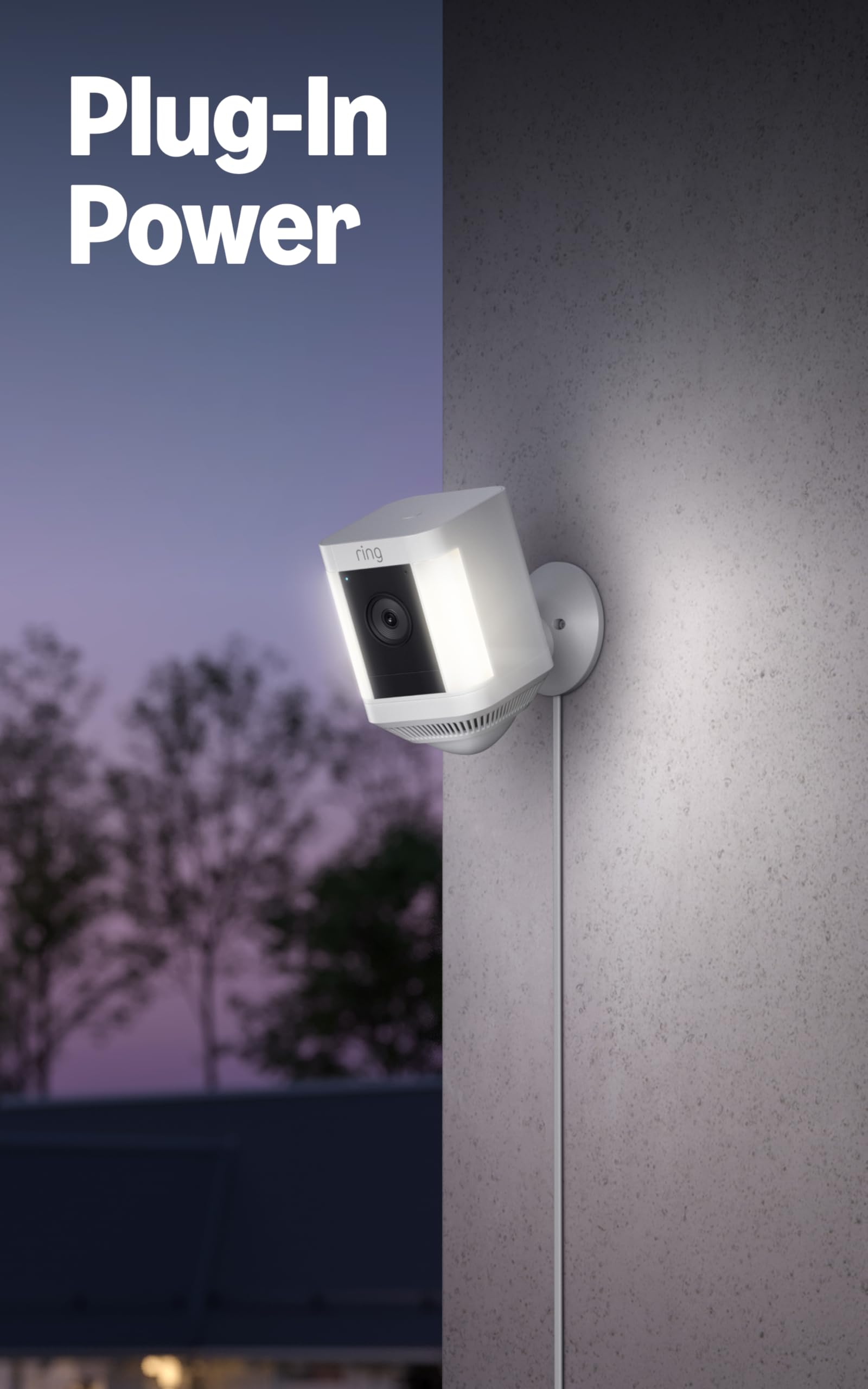 Ring Spotlight Cam Plus LED motion spots illuminate yard for nighttime security.