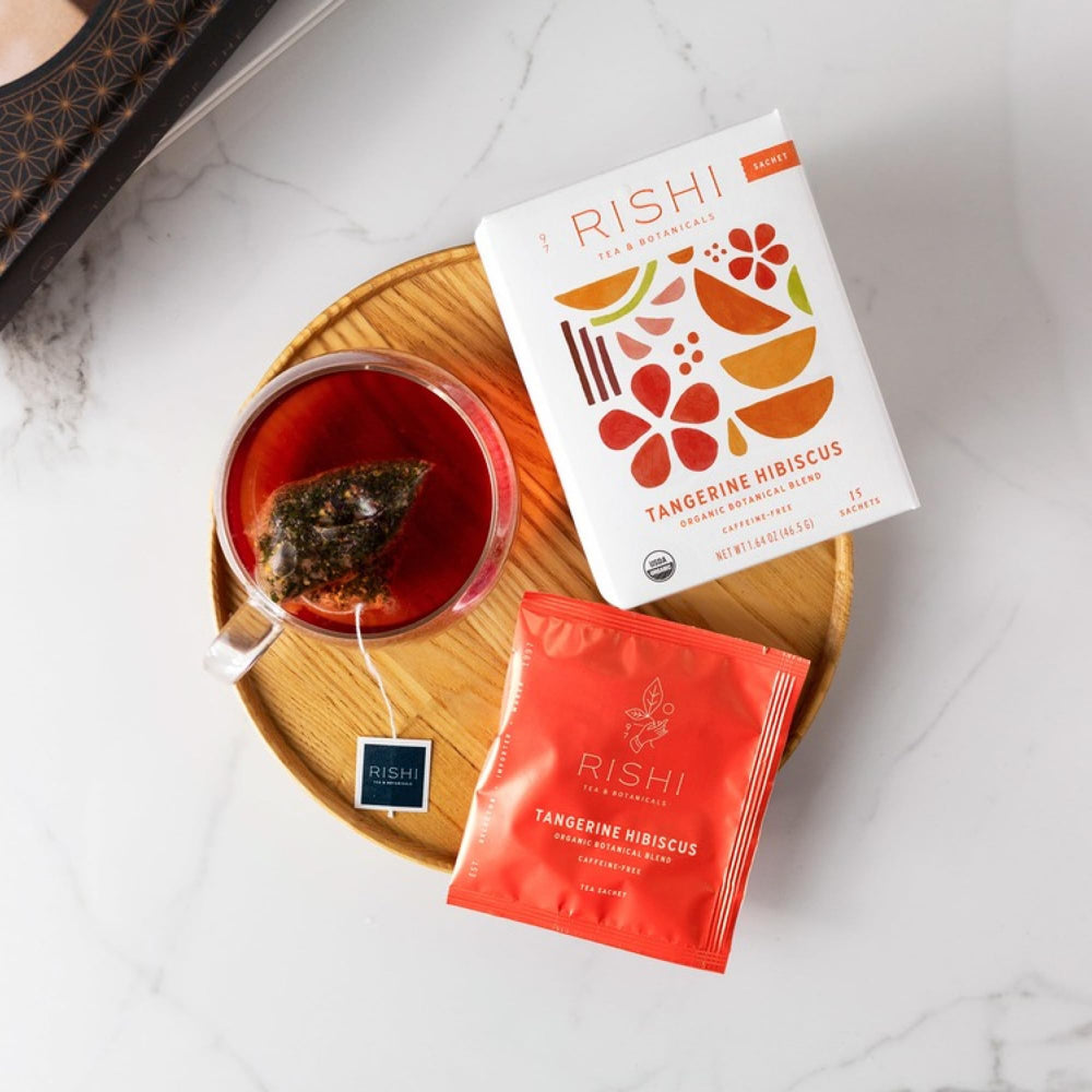 Rishi Tangerine Hibiscus dried blend in a bowl ready to steep.