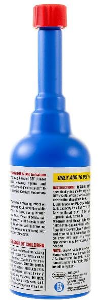 DEF tank cap and blue cap indicating proper installation for safe dosing