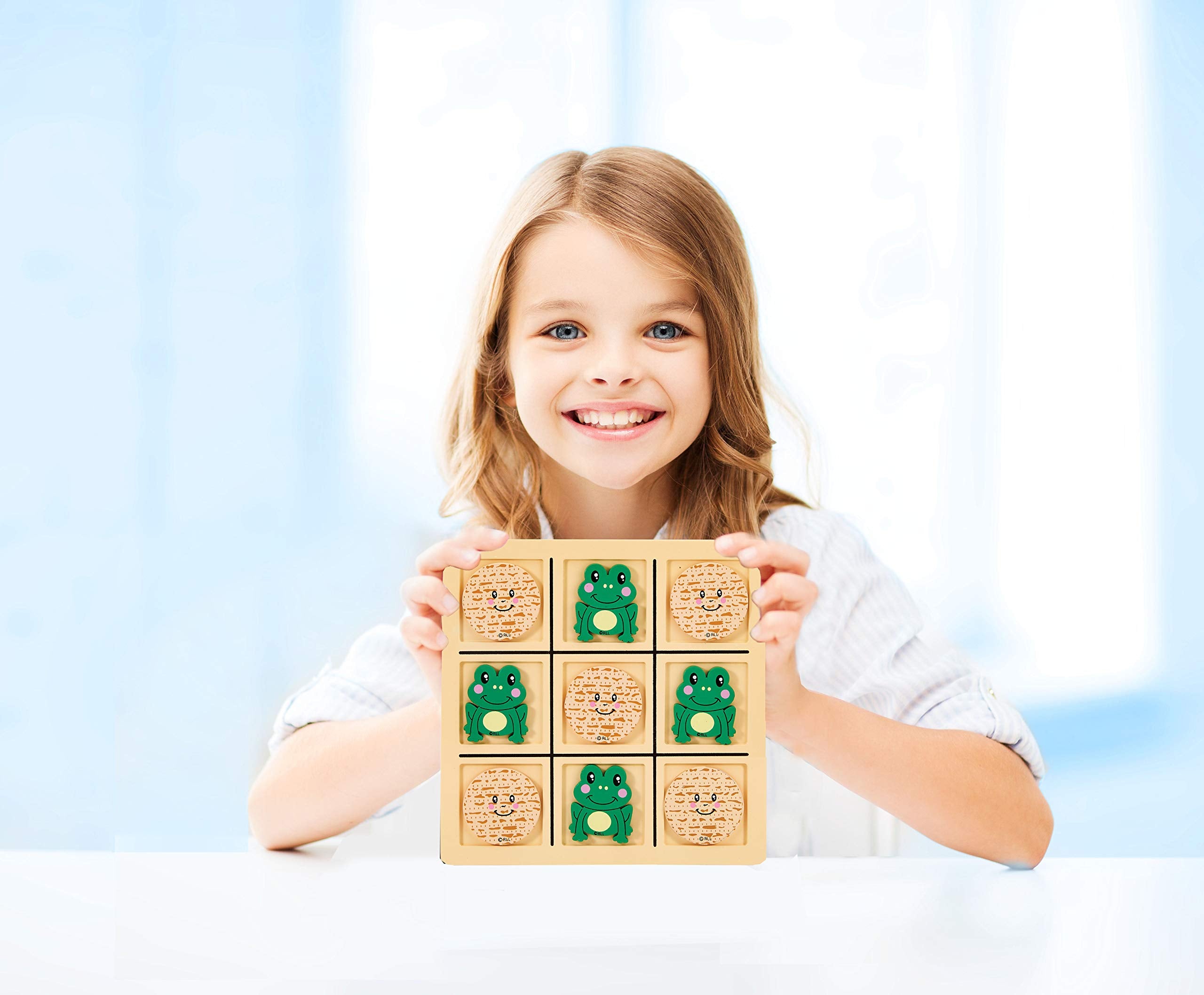 Rite Lite frog pieces and matzah balls ready for a family game night.