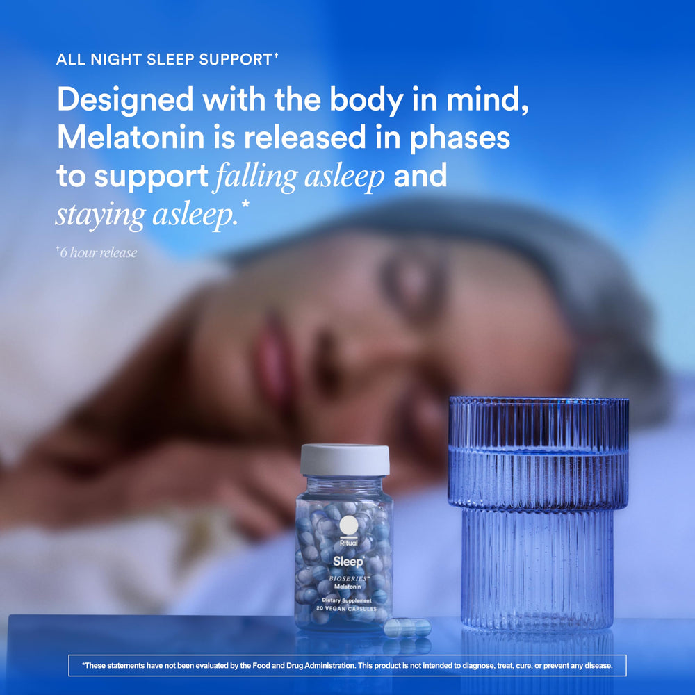 Glass bottle with capsules ready to take before bed.