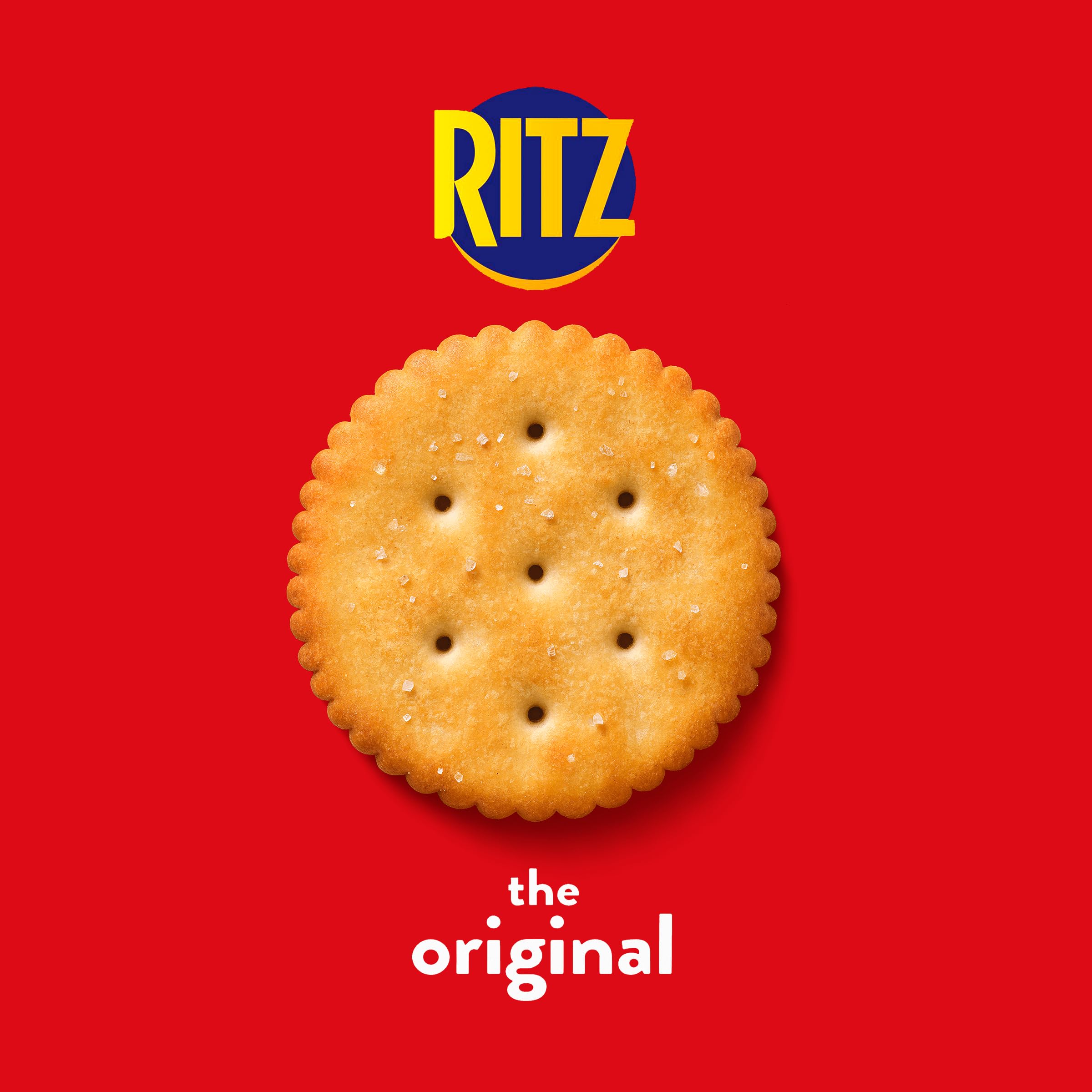 Serving RITZ Original Crackers on a board with fruit and toppings.
