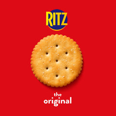 Serving RITZ Original Crackers on a board with fruit and toppings.