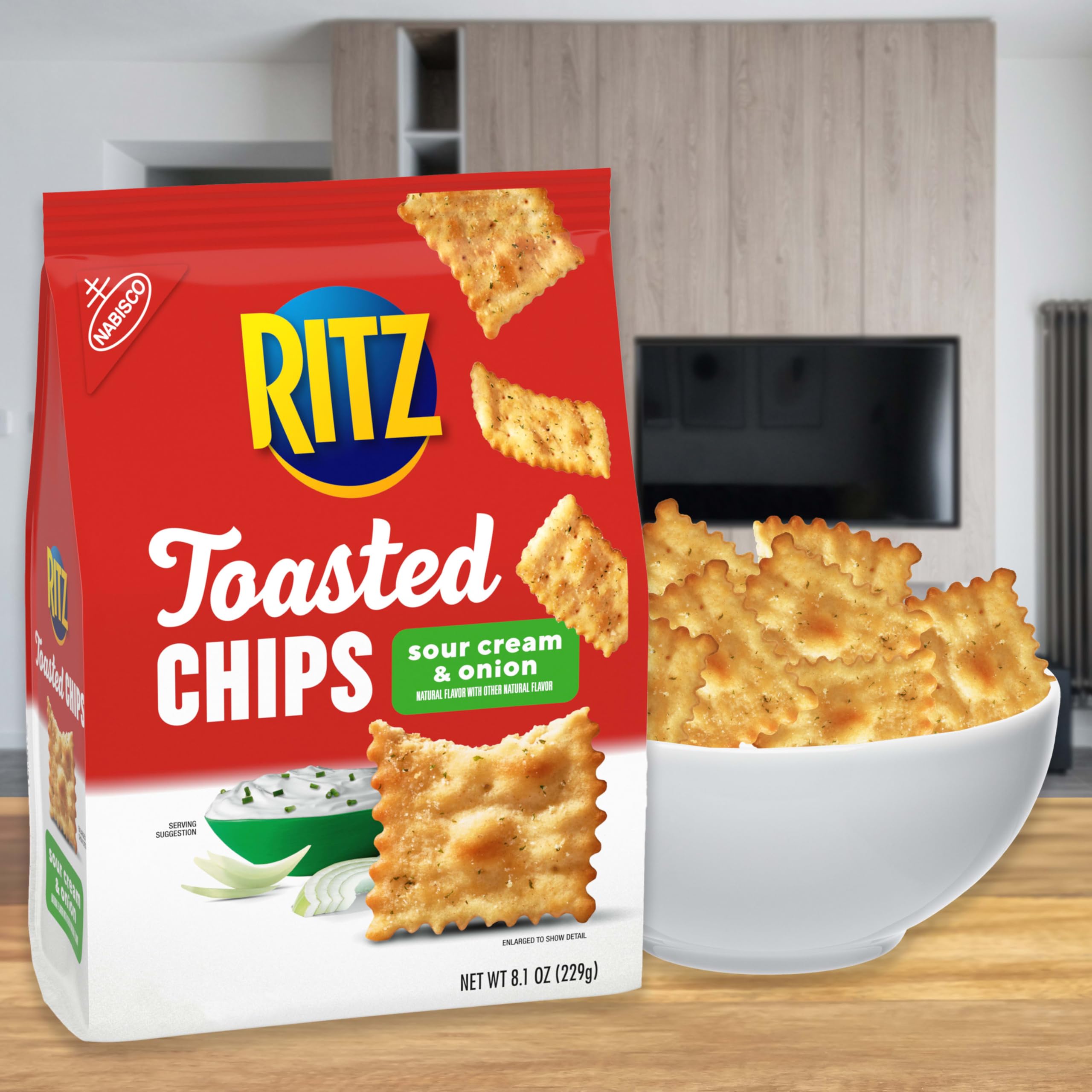 Ritz Toasted Chips Cheddar closeup reveals golden, crunchy texture.