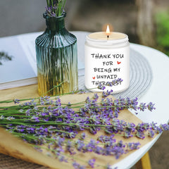 RIZOOCE lavender candle on a coffee table, creating cozy living room ambiance.