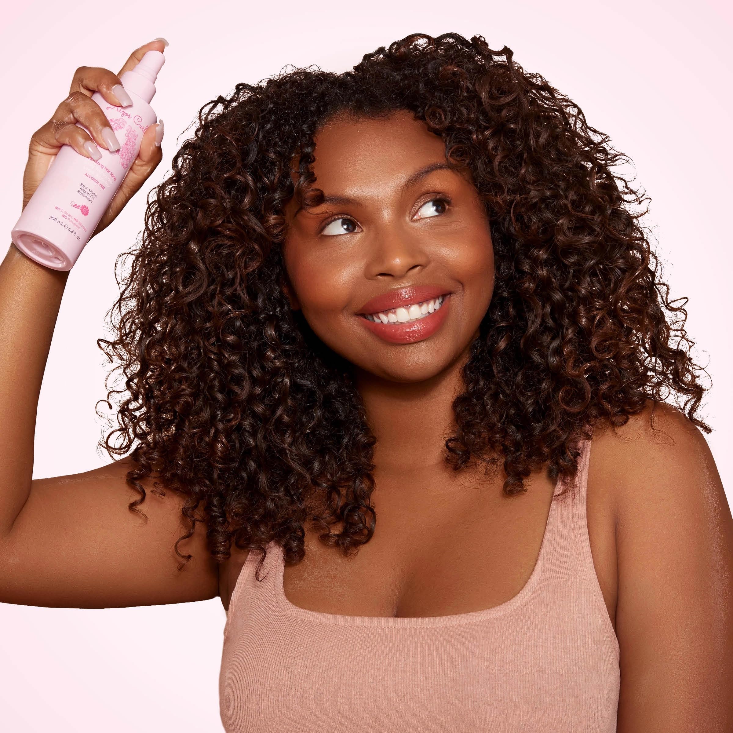 Rizos Curls alcohol-free spray highlight with argan oil for added shine.