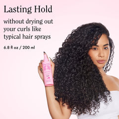 Rizos Curls spray bottle with pump for quick, lightweight styling.