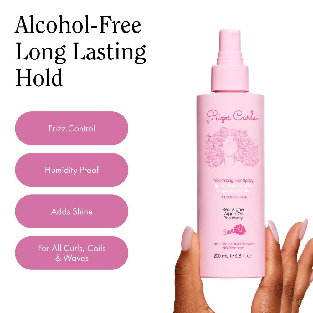 Rizos Curls spray finishing a style for smooth shine and volume.