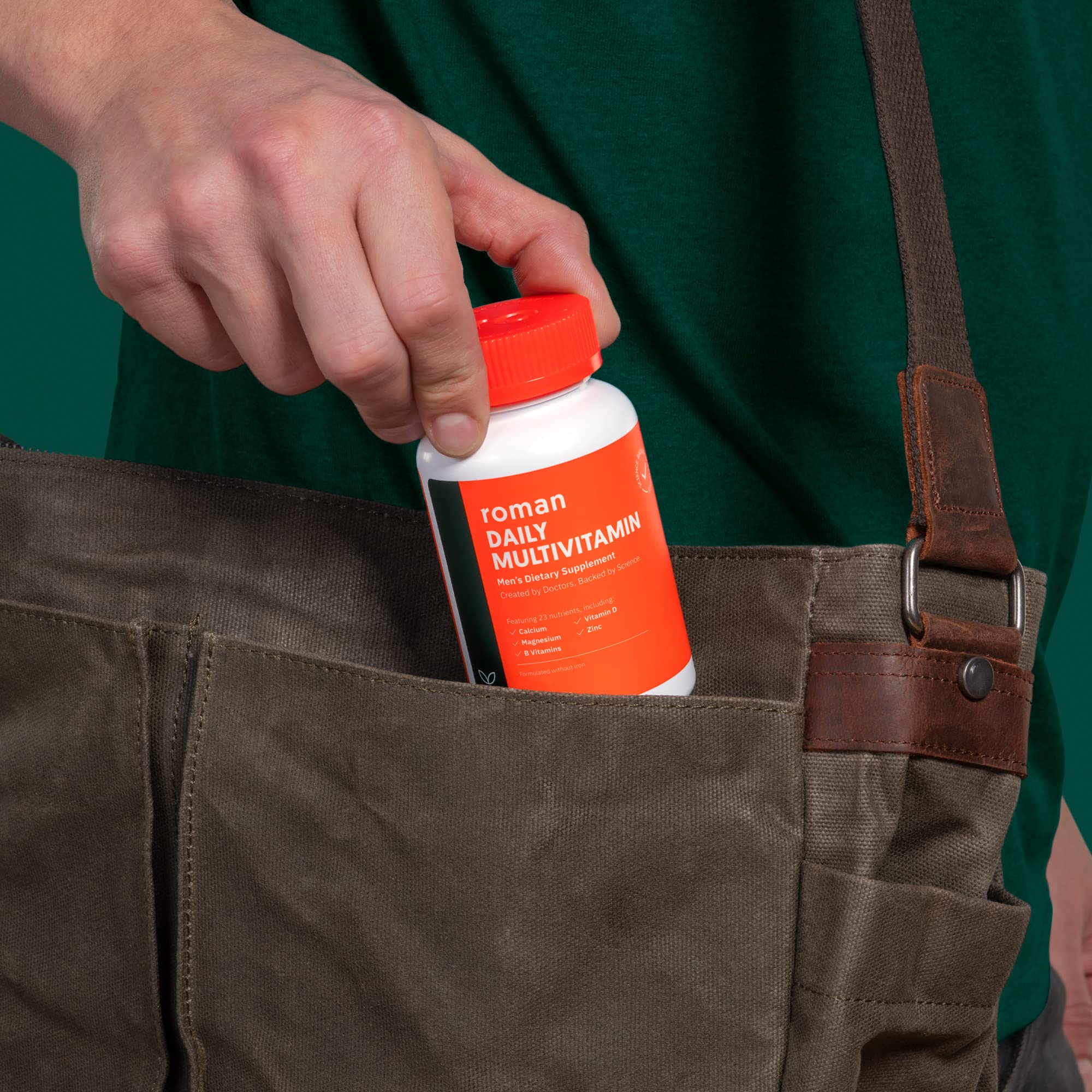 Ro Daily Multivitamin for Men tablets in hand for daily routine.