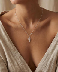 Robaice cross necklace on an 18-inch chain suits many necklines.