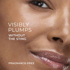 Close-up of tingling sensation during RoC Lip Volumizer application.
