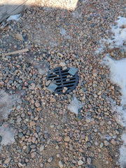 Rocky Mountain Goods debris-blocking grate keeps outdoor drains clear.