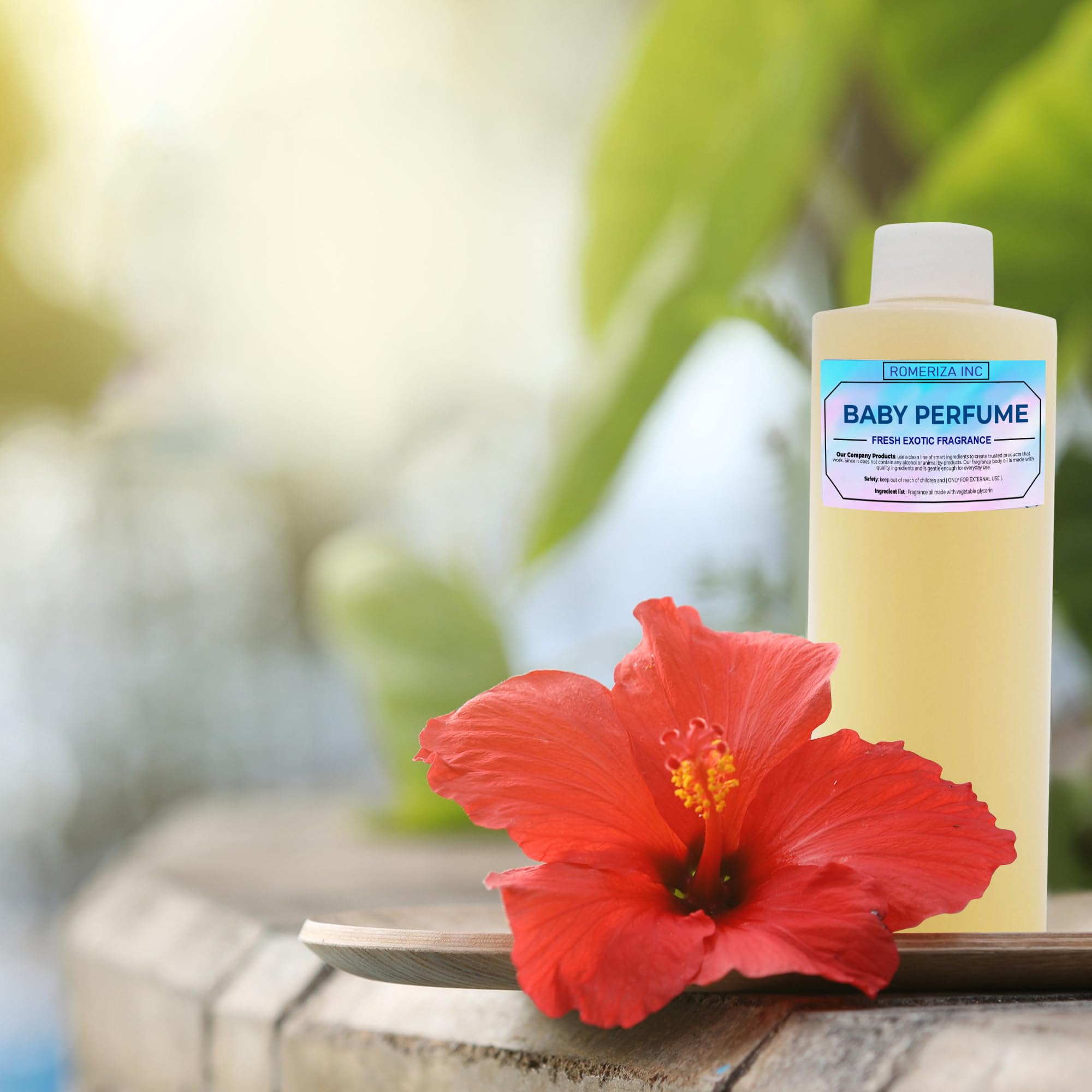 ROMERIZA INC. lifestyle shot features subtle scent on wrists.