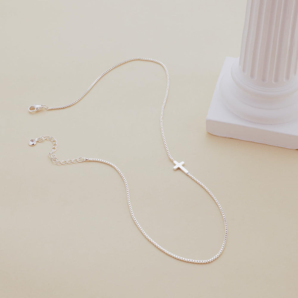 Rotnso cross pendant delicate design adds subtle elegance to outfits