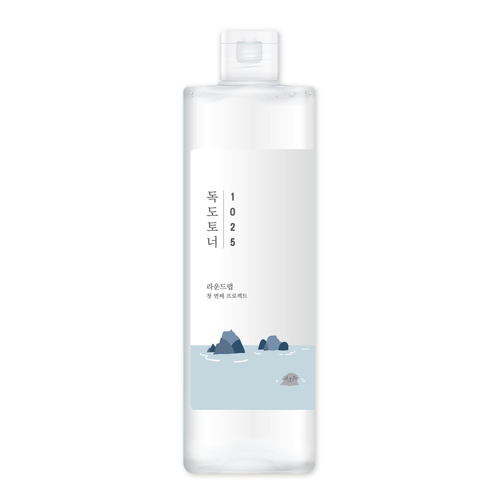 ROUND LAB 1025 Dokdo Toner pour into hand illustrating quick absorption.