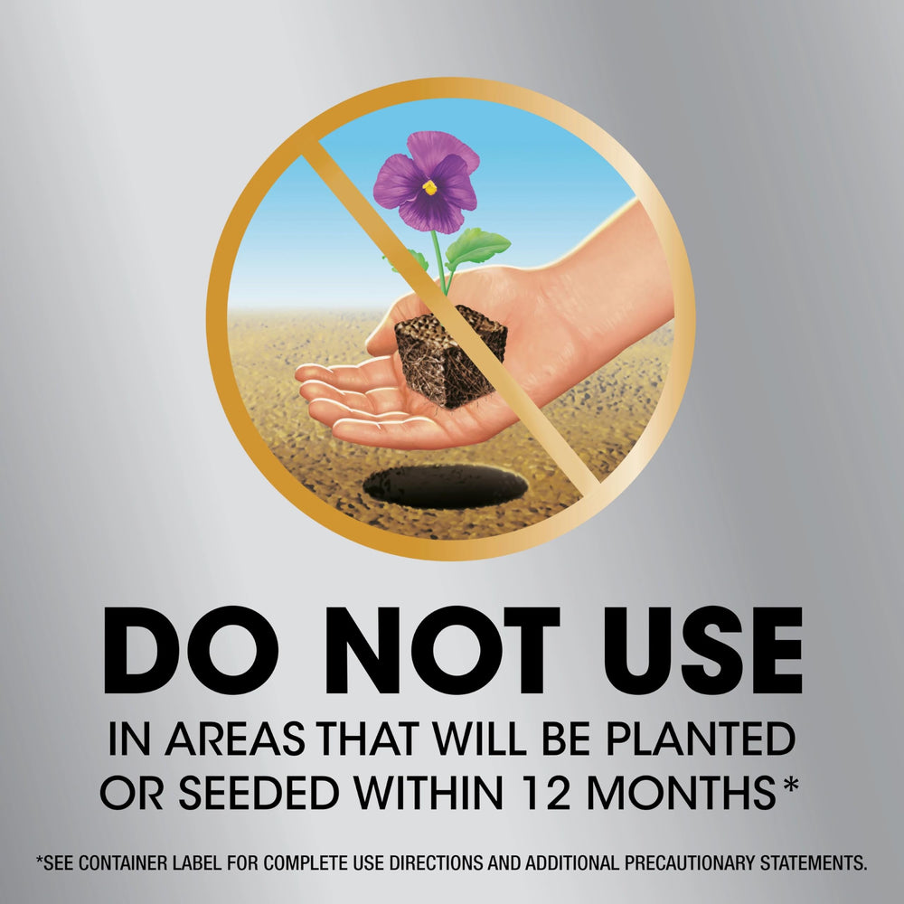 Weed control along a garden border with Roundup Dual Action 365.