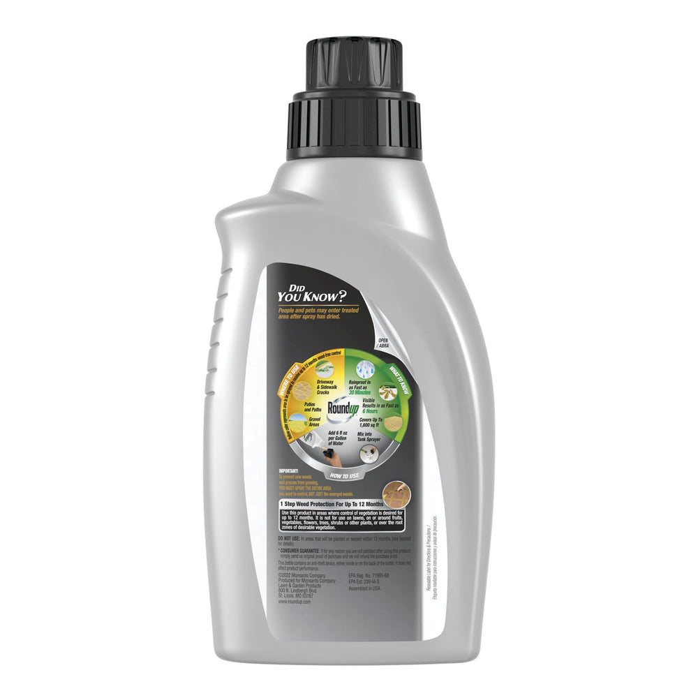 Measuring cup with Roundup Dual Action 365 mixing guidance for precise dosing.