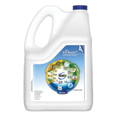 Roundup Weed & Grass Killer4 refill applied near flower bed targets weeds around perennials.