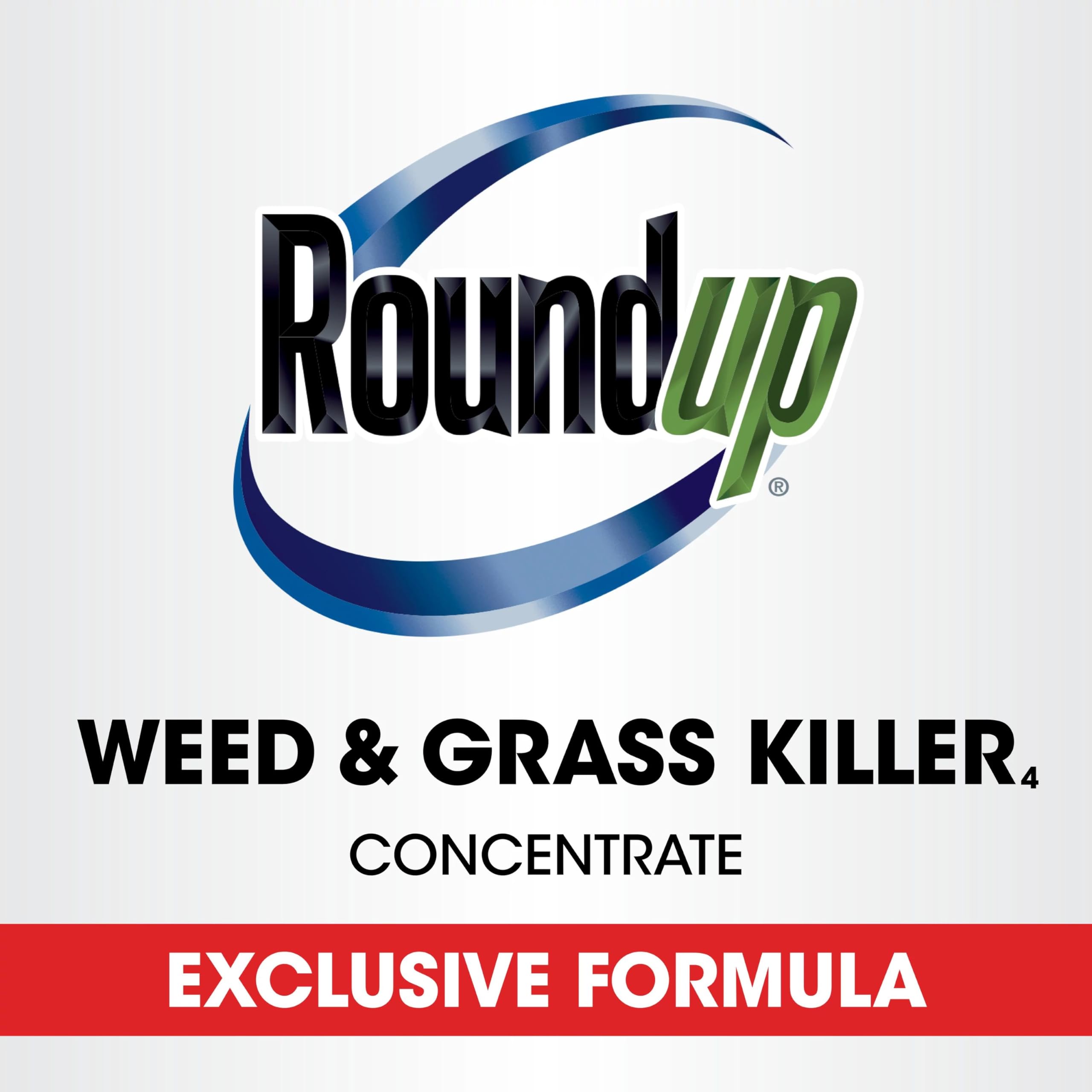Roundup weed killer being applied in a flower bed