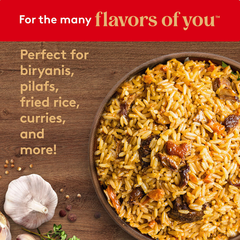 Royal brown basmati rice steaming bowl conveys natural aroma and readiness for curry or pilaf.