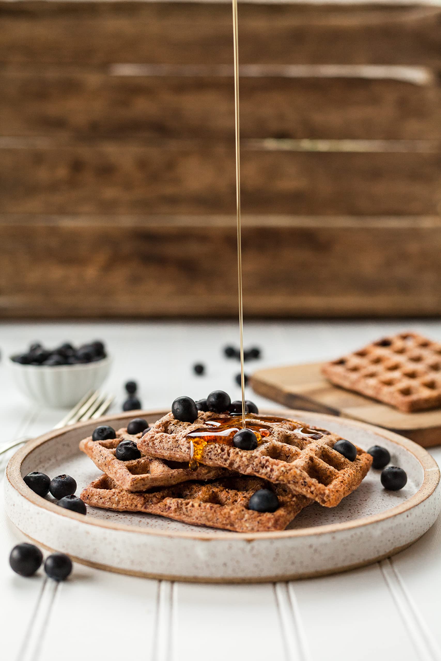 Royal Palm Date Syrup pour in pan highlighting versatile glaze and cooking use.