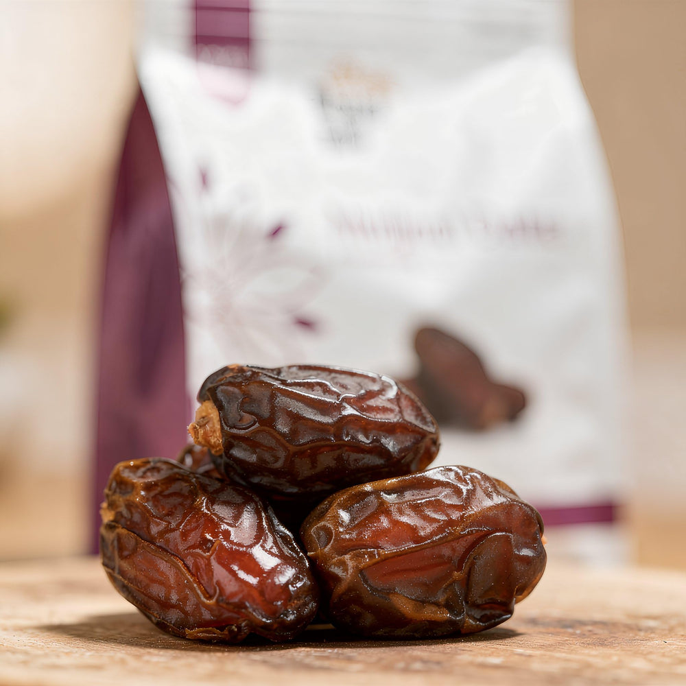 Royal Palm large soft dates close-up shows chewy texture and richness.