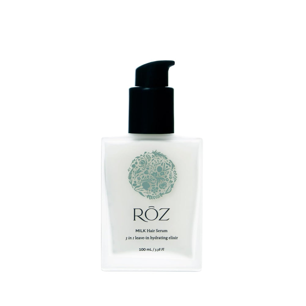RŌZ Milk Hair Serum bottle pour for lightweight hydration across hair types.