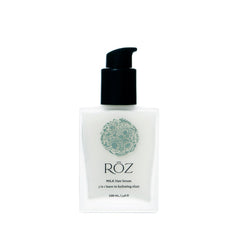 RŌZ Milk Hair Serum bottle pour for lightweight hydration across hair types.