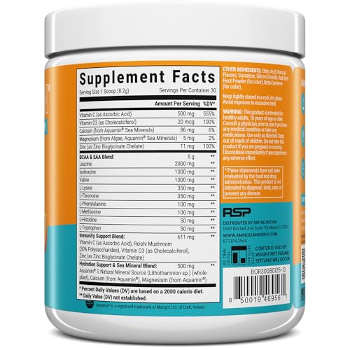 AminoLean scoop beside a glass on a gym bench to show amino acids for recovery.