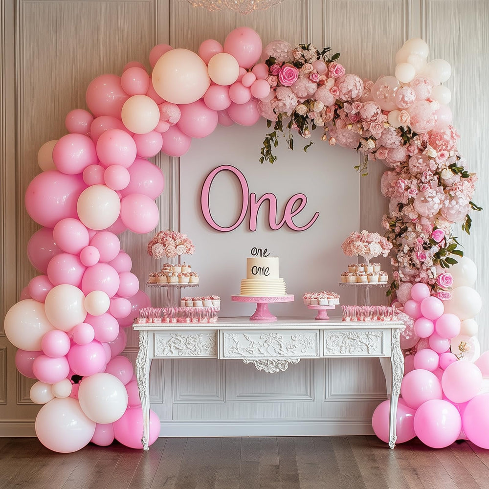 RUBFAC garland arch decoration idea featuring pastel pink balloons.