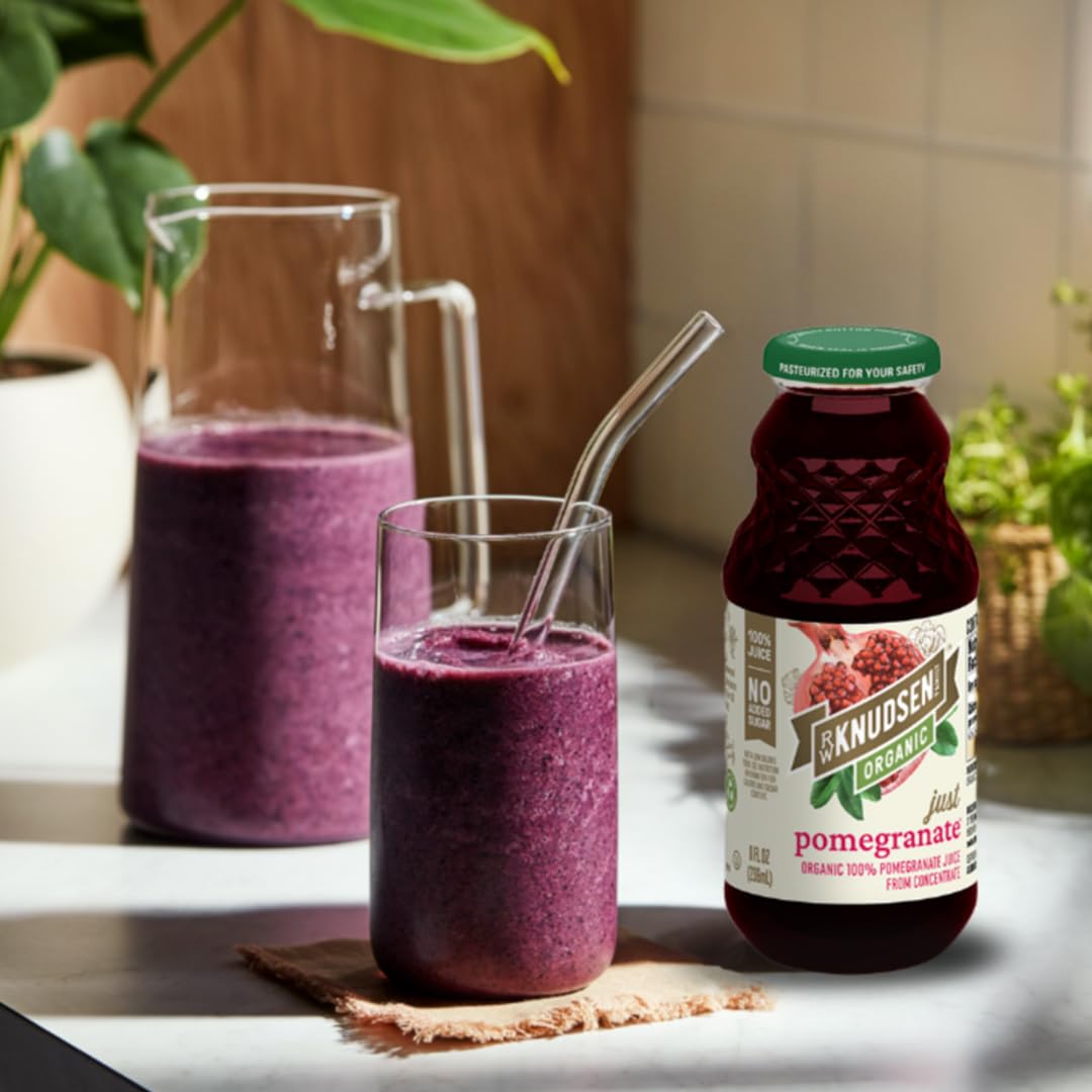 Glass of R.W. Knudsen Organic Pomegranate Juice ready for a healthy beverage.