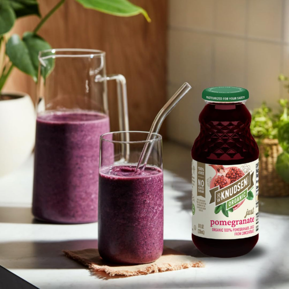 Glass of R.W. Knudsen Organic Pomegranate Juice ready for a healthy beverage.
