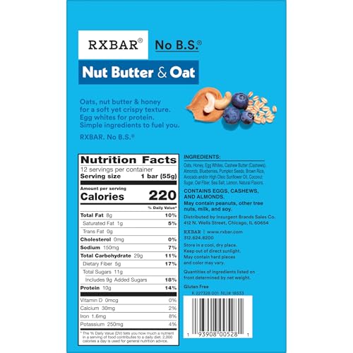 RXBAR bar close-up shows creamy cashew butter and blueberries on a clean kitchen counter