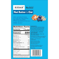 RXBAR bar close-up shows creamy cashew butter and blueberries on a clean kitchen counter