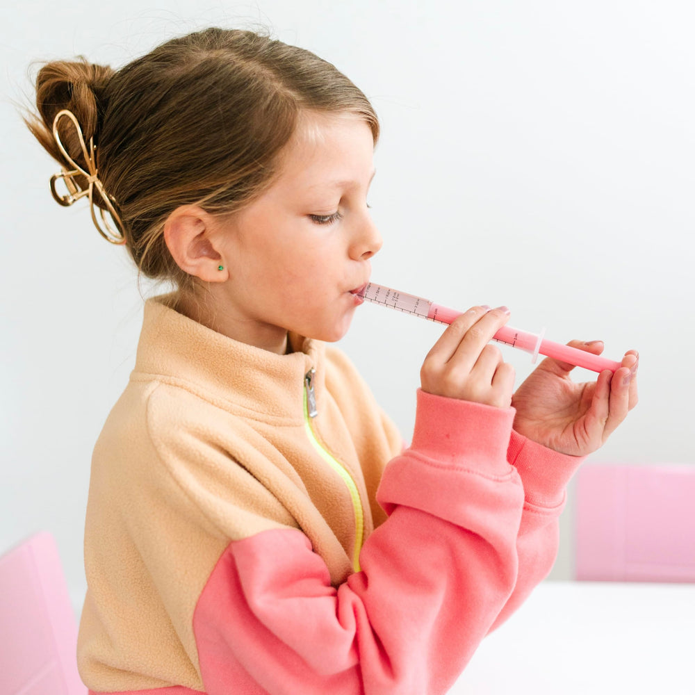 Ryan & Rose Cutie Dose family-friendly solution for kids and caregivers