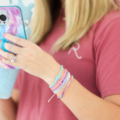 Ryan & Rose Jesus bracelets Cross silicone Kaleidoscope packaging display highlights 25-pack value.