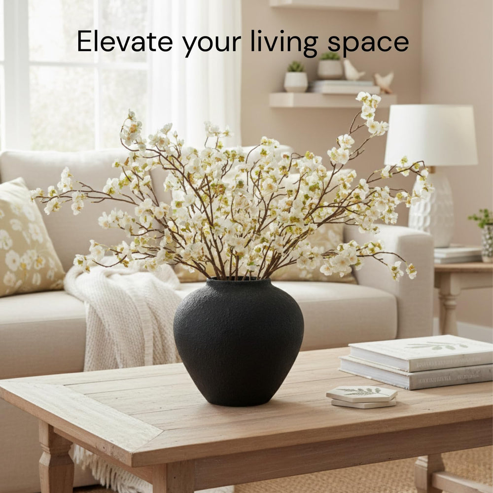 RyddeligHome large vase arrangement featuring tall cherry blossoms for dramatic decor.