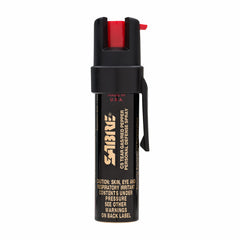 SABRE compact defense spray with belt clip for quick access.
