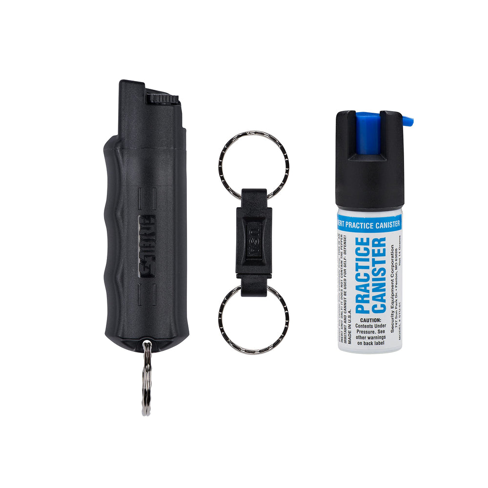 SABRE pepper spray with quick-release keychain for fast access during emergencies.