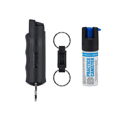 SABRE pepper spray with quick-release keychain for fast access during emergencies.