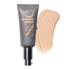 Saie Slip Tint SPF 35 bottle closeup showing hydrating glow.