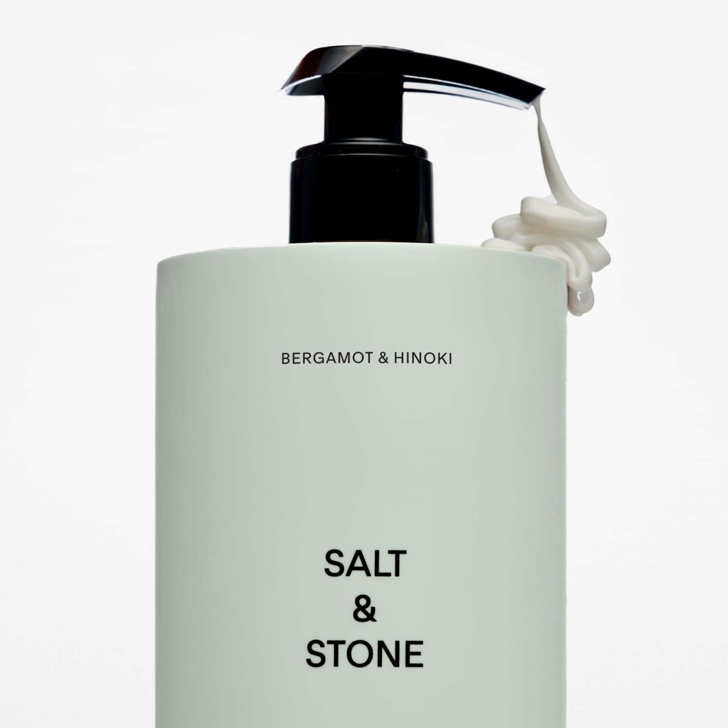 Salt & Stone fast-absorbing finish shown on skin.