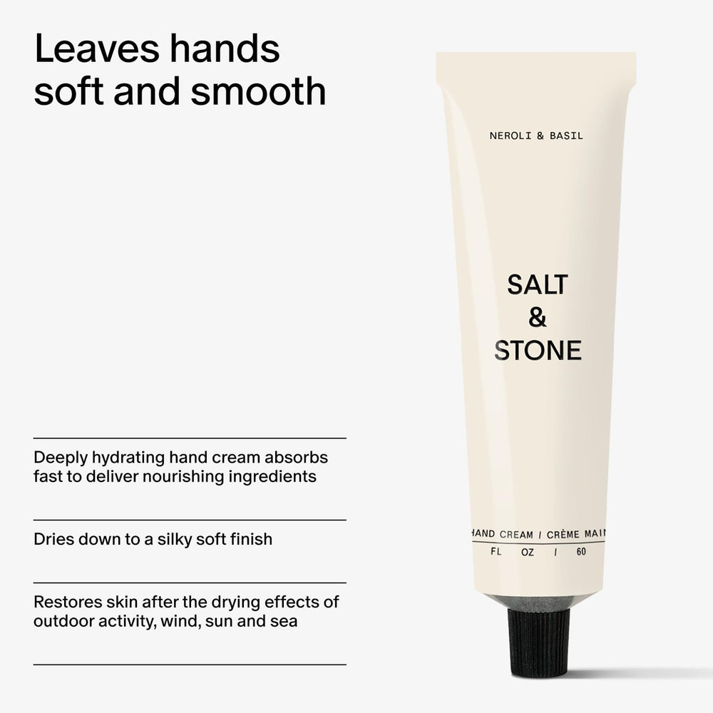 Hands applying Salt and Stone hand cream in a closeup shot.