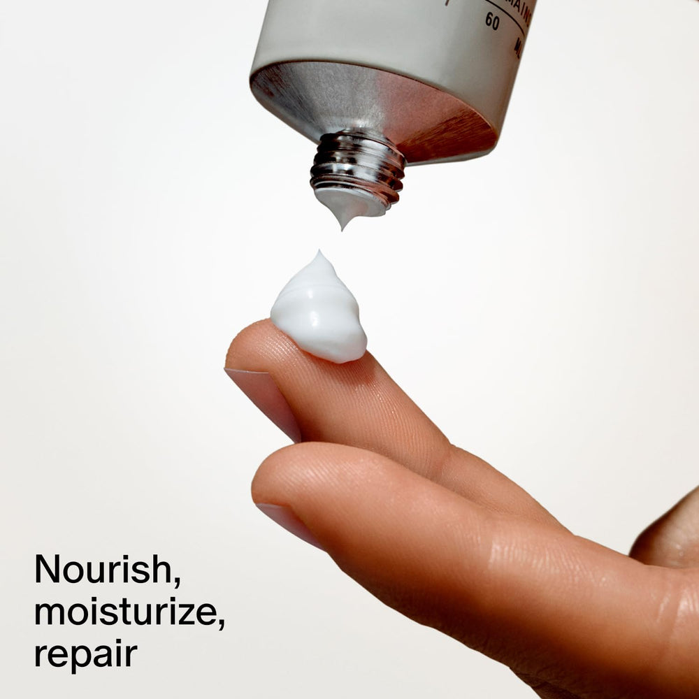 Salt & Stone hand cream packaging on a clean surface.