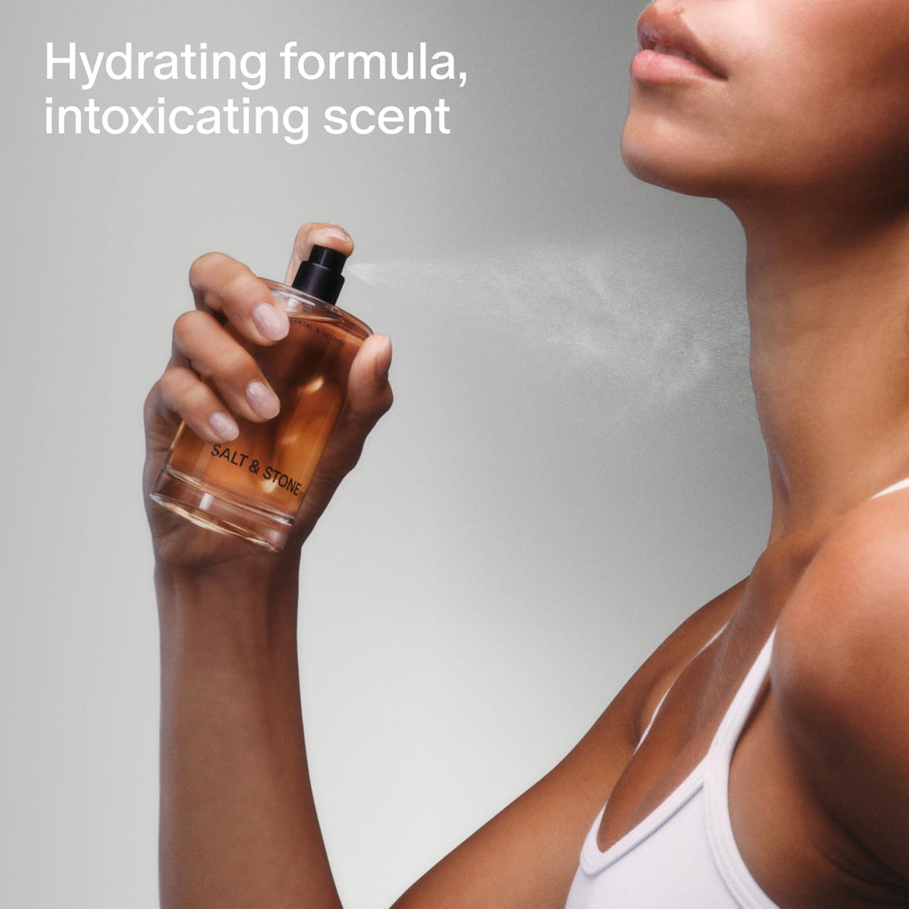 Salt and Stone body mist spray over shoulders for a refreshed, long-lasting aroma.