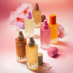 Saltair body oil applied to damp post-shower skin for silky hydration.